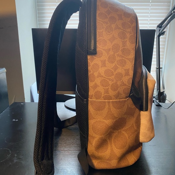 coach backpack brown leather HENRY IN PEBBLE Black Introducing the Coach Hitch Backpack in a sophisticated Redwood hue Coach 1941 Brown Hitch Backpack